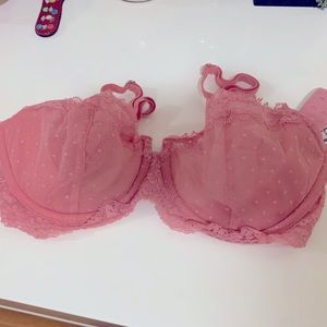 Sexy lingerie. Pink lace balconette bra. See-through.